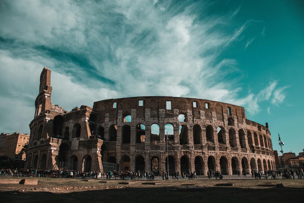 Stunning view of the Colosseum in Rome showcasing its ancient architecture and historic grandeur.