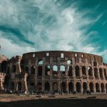 Stunning view of the Colosseum in Rome showcasing its ancient architecture and historic grandeur.