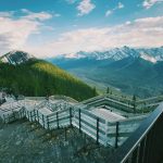 Captivating mountain view from a wooden stairway in Banff National Park, Canada.